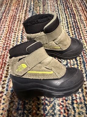The North Face Kids Tan and Black Snow Boots with Yellow Accent